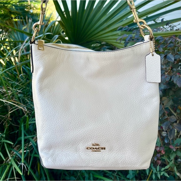 Coach Handbags - Coach White Abby Duffle Pebbled Leather Shoulder Bag